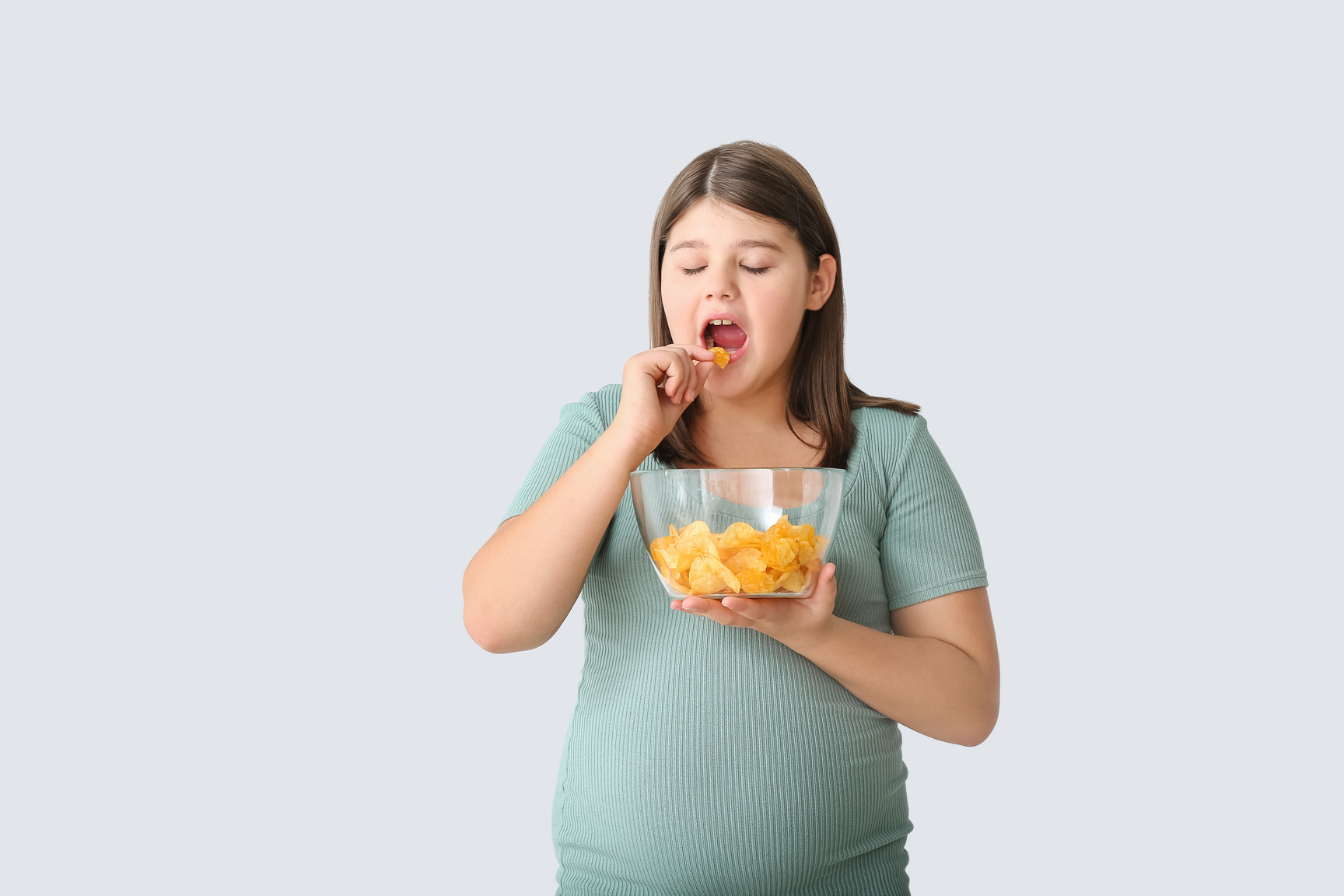 Teenager Eating Chips 